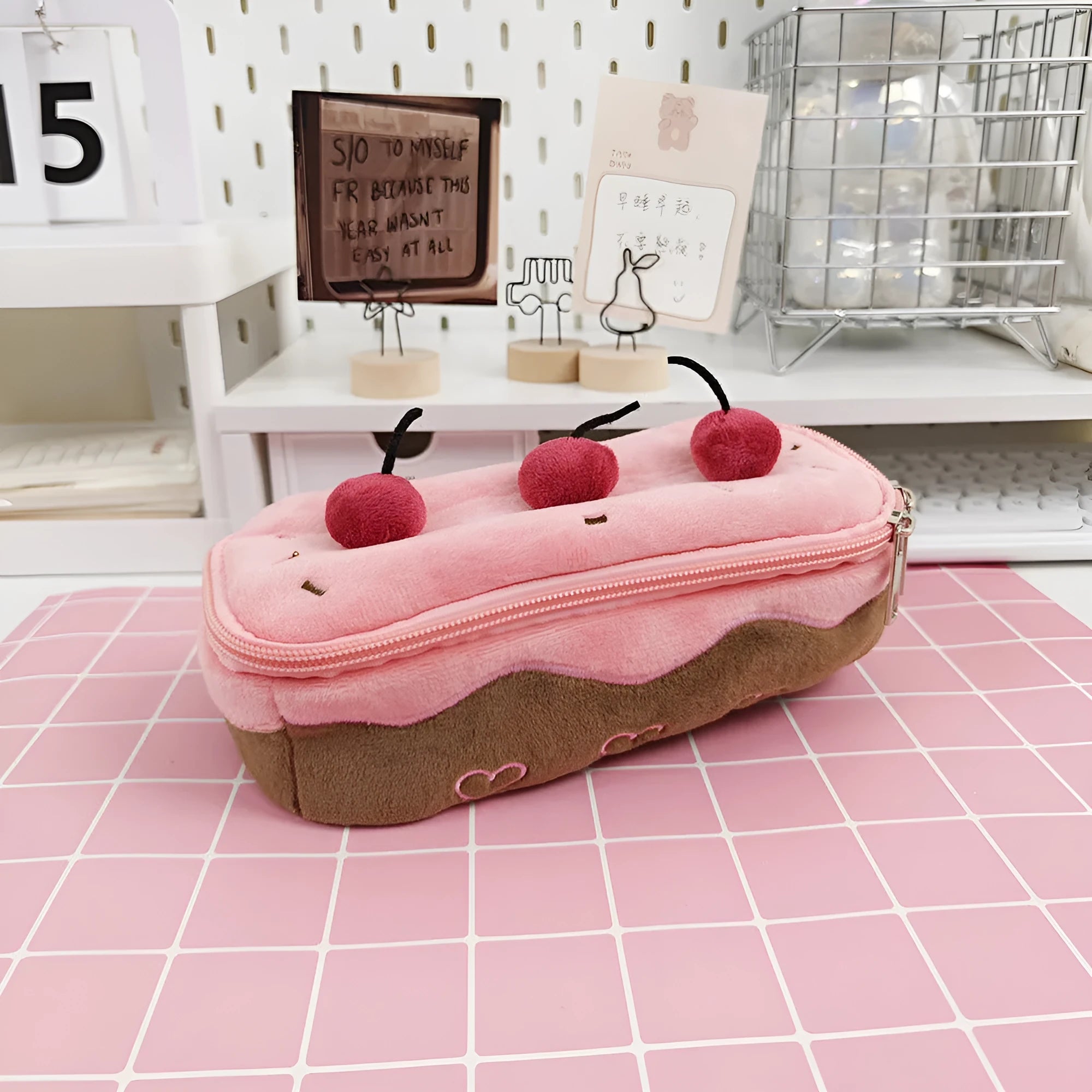 Cherry cake print velvet pencil case with a zip, shown closed.