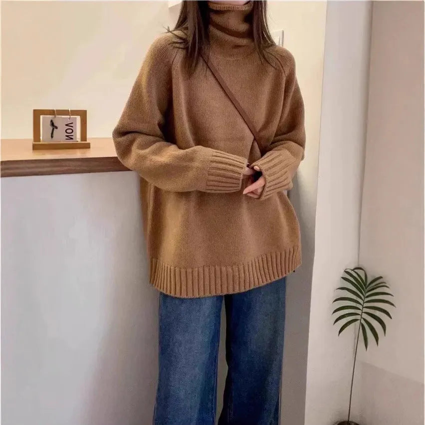 Women's loose thick turtleneck sweater in red with curling pile collar and textured mesh fabric
