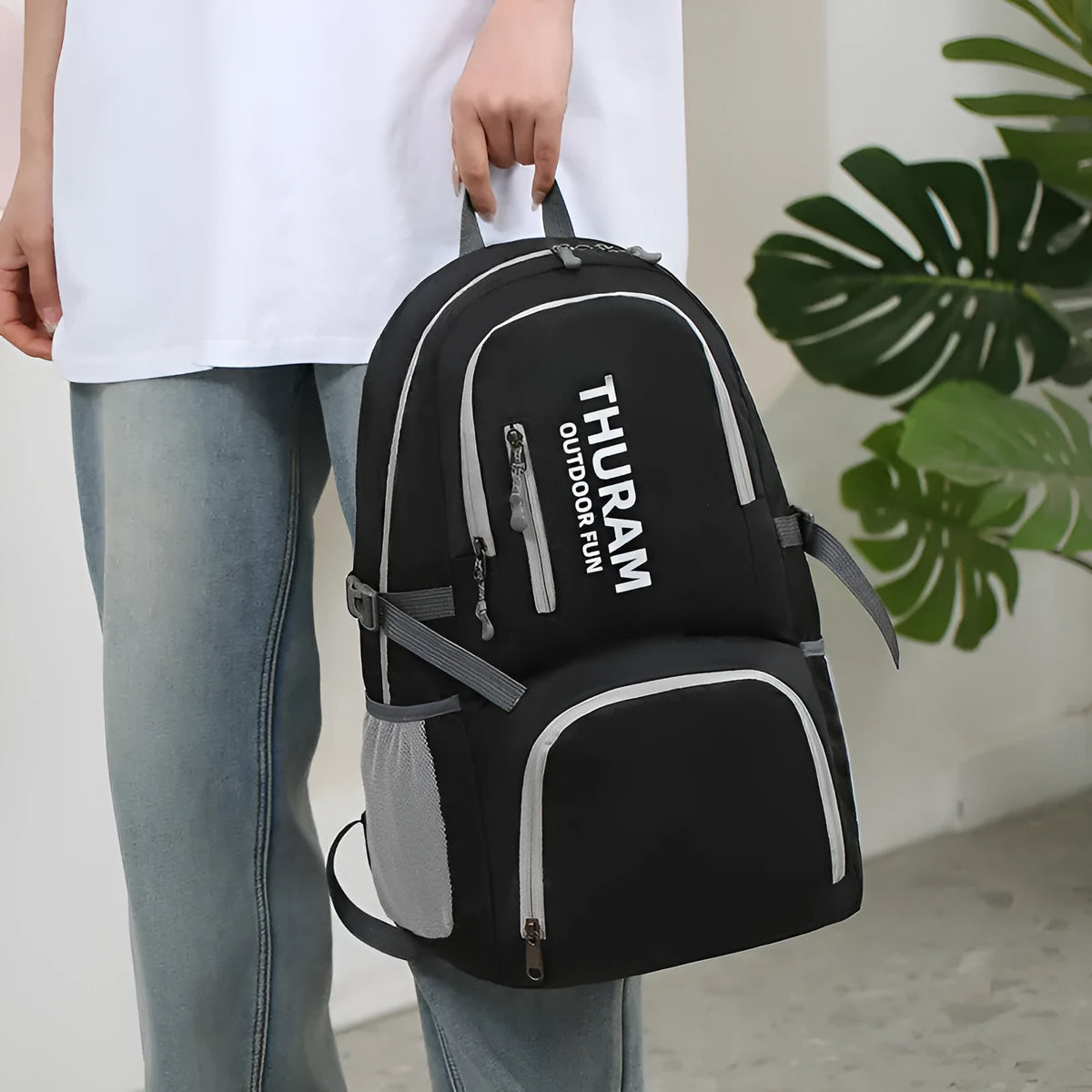 Portable folding shoulder bag 20-35L in dark blue for outdoor hiking