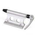 Silver metal quick release fixing clip for bicycle front fork on a white background.