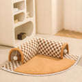 Coffee coloured plush fan-shaped pet bed with attached tunnel, showing anti-slip base.