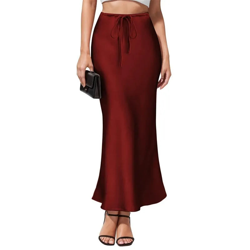 Asymmetric high-waist acetate satin skirt in solid colour with irregular stitching detail