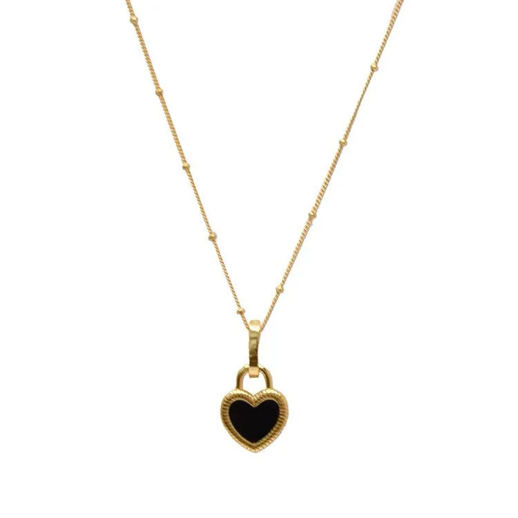 Double-sided shell love pendant necklace with mixed gem inlay on adjustable chain, available in gold-plated copper or titanium steel