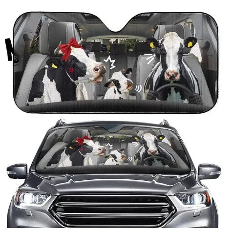Telescopic aluminium foil car sun shield extended across a vehicle windscreen