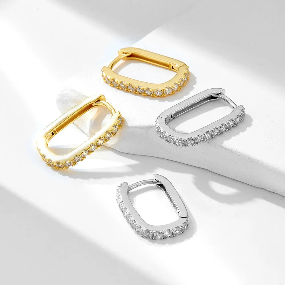 S925 sterling silver oval zircon ear clips in geometric designs with white or yellow finish
