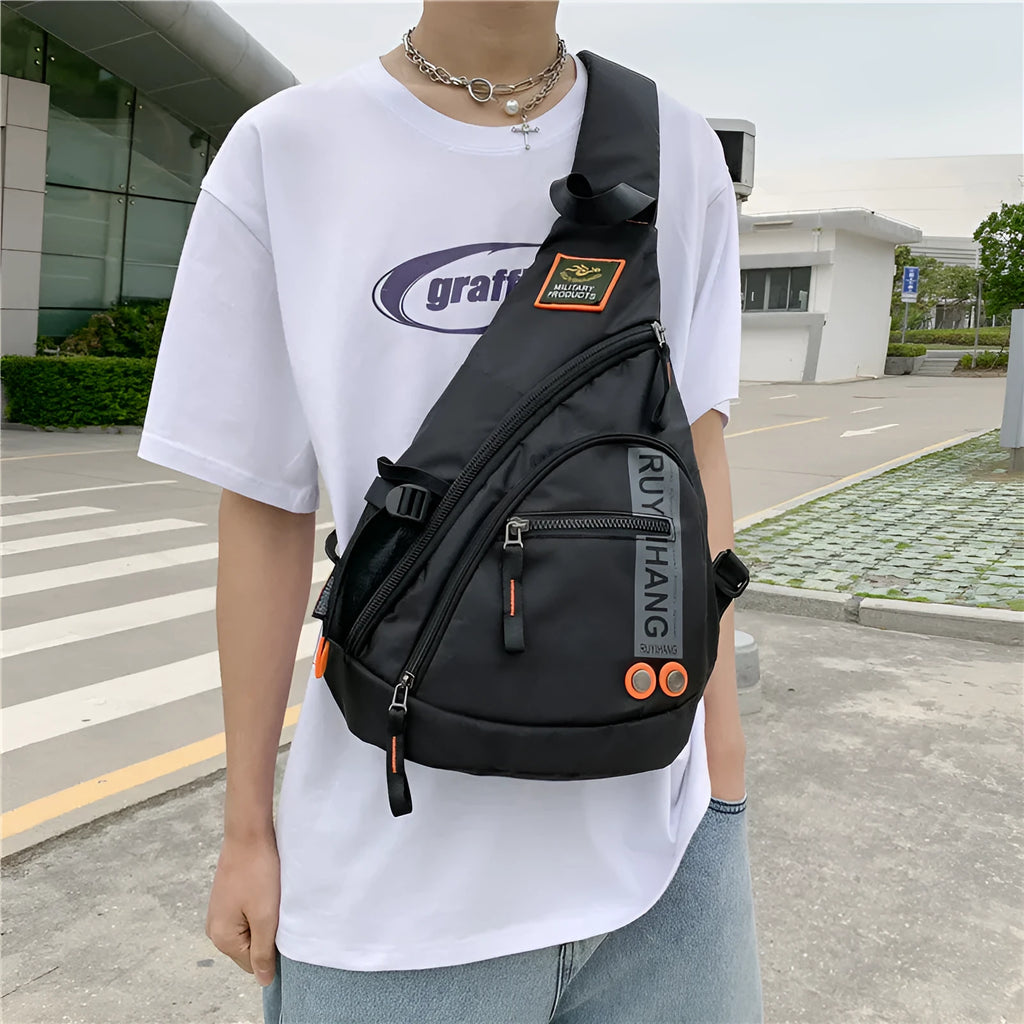 Unisex outdoor large capacity nylon chest bag in black with ventilation slots and adjustable strap