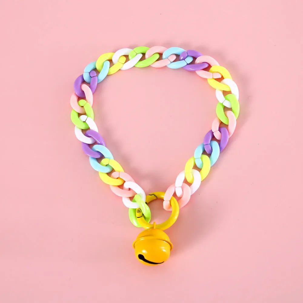 Macaron candy colour plastic pet collar on white background showing chain blue, pink and mixed colour options