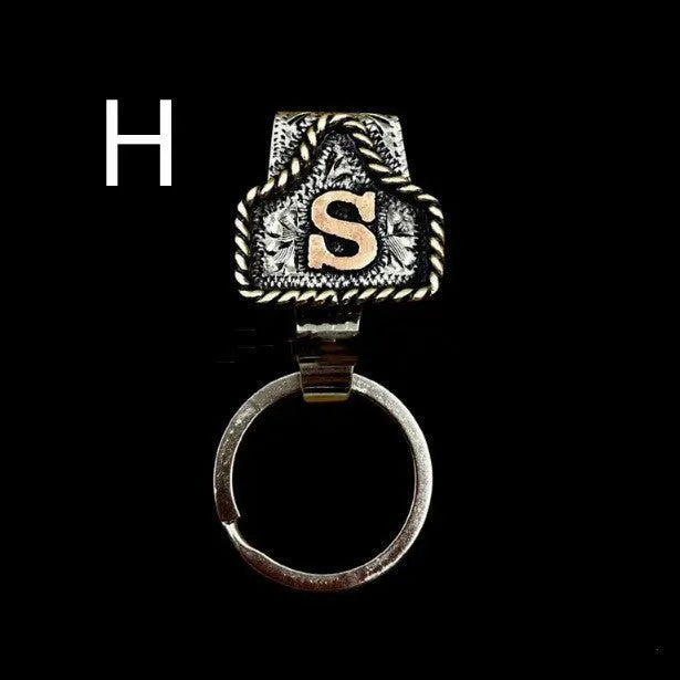 Handmade metal cow tag belt keychain in rustic design with multiple colour options