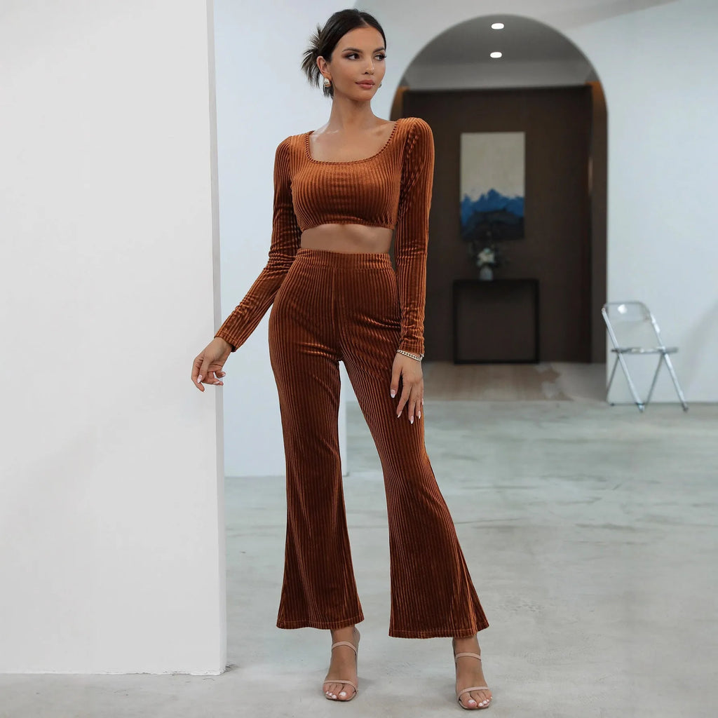 Caramel coloured long sleeve sweater and trousers casual set on a hanger
