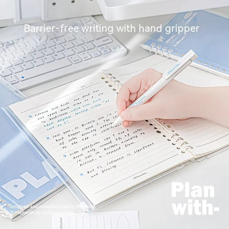 Blue and white A5 PVC spiral notebook with Wire-O binding on a flat surface