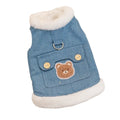 Denim blue pet vest with white wool lining, bear print, wooden buttons, and metal D-ring.