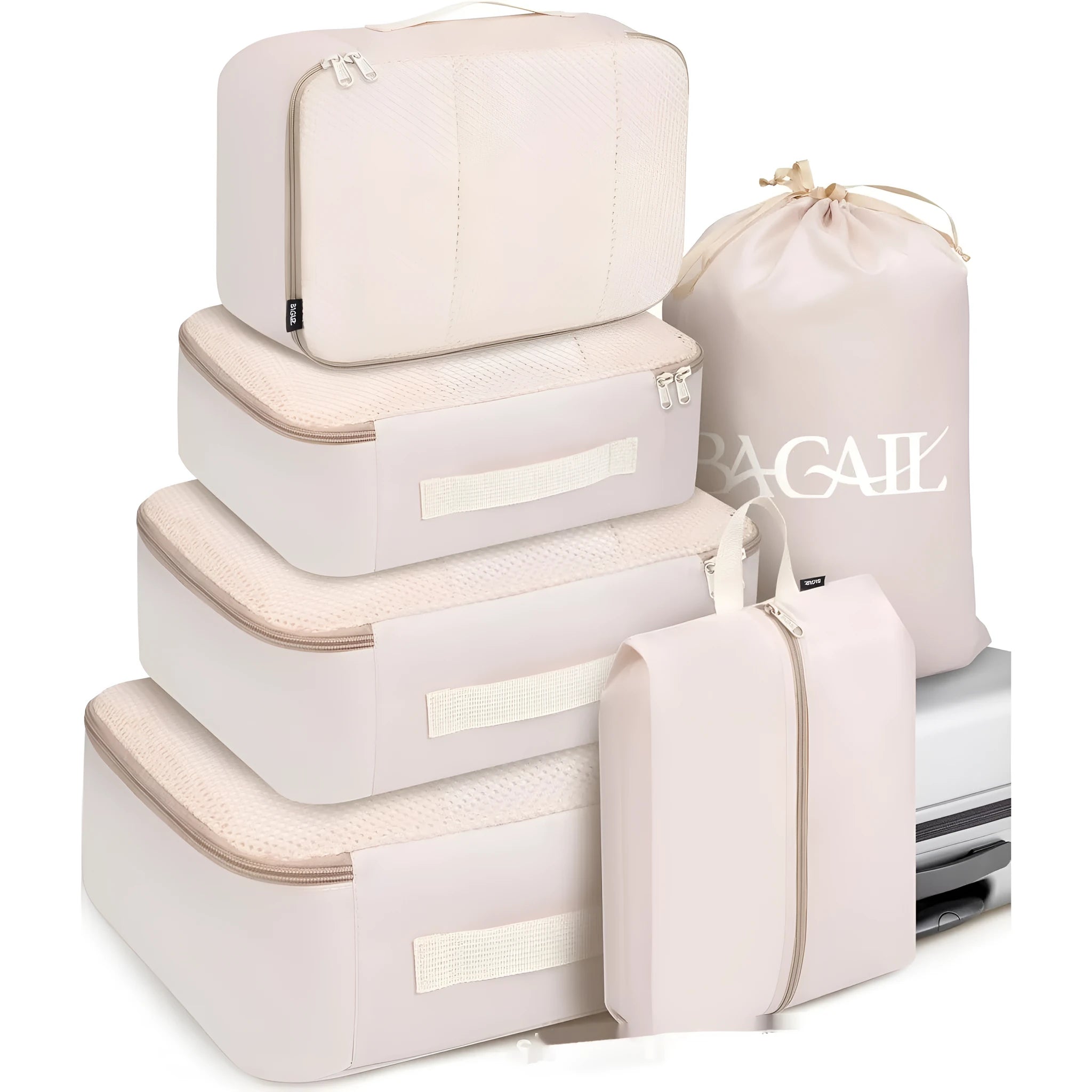 Set of eight cubic packing cubes for travel organisation in various colours including beige, black, and pink leopard print.