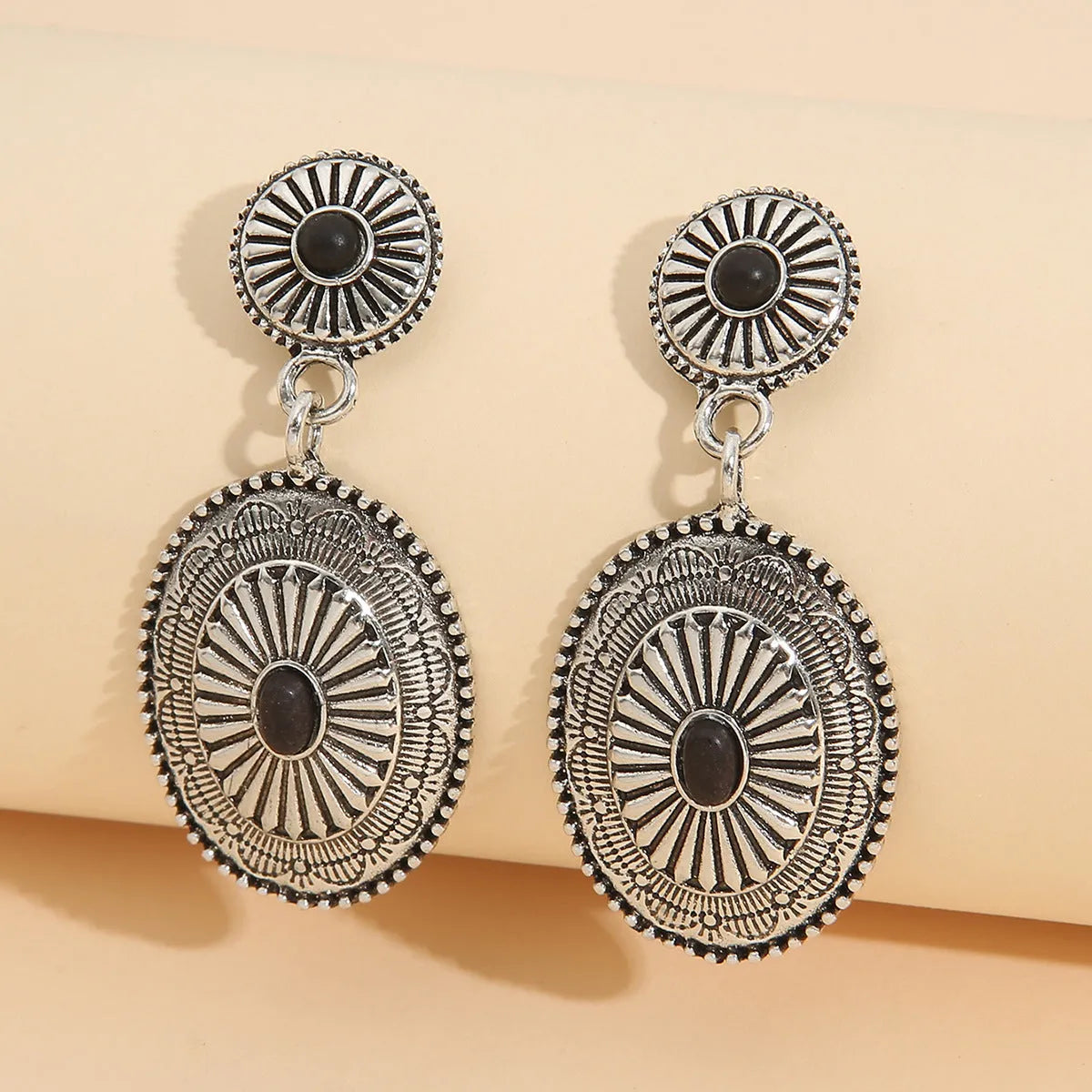 Silver-turquoise alloy drop earrings with retro pumpkin flower design and electroplated finish.