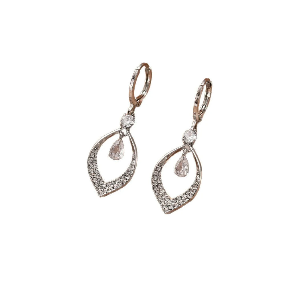 Women's gold and silver water drop tassel earrings made from zircon and copper.