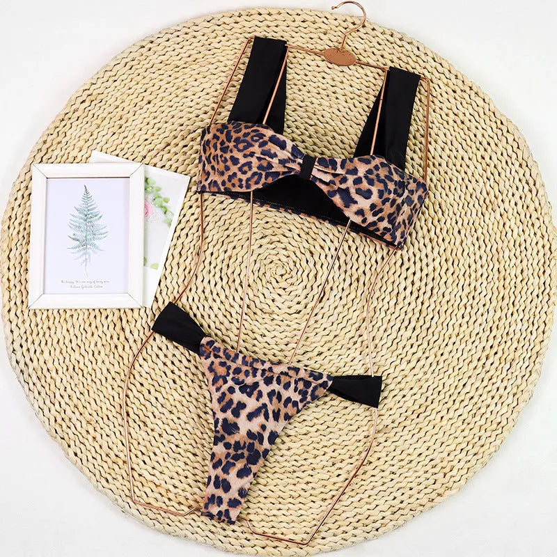 Leopard print tube top one-piece swimsuit with split detail on a woman