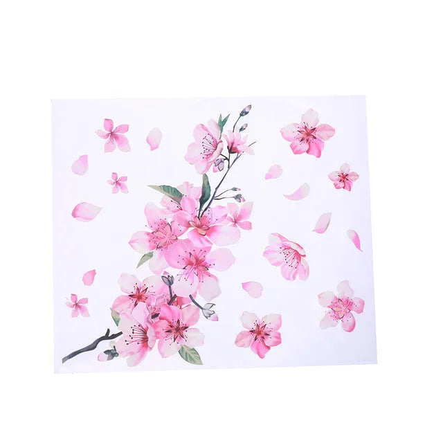 Close-up of a cherry blossom flower pattern on a PVC car sticker, shown with a peel-off backing.
