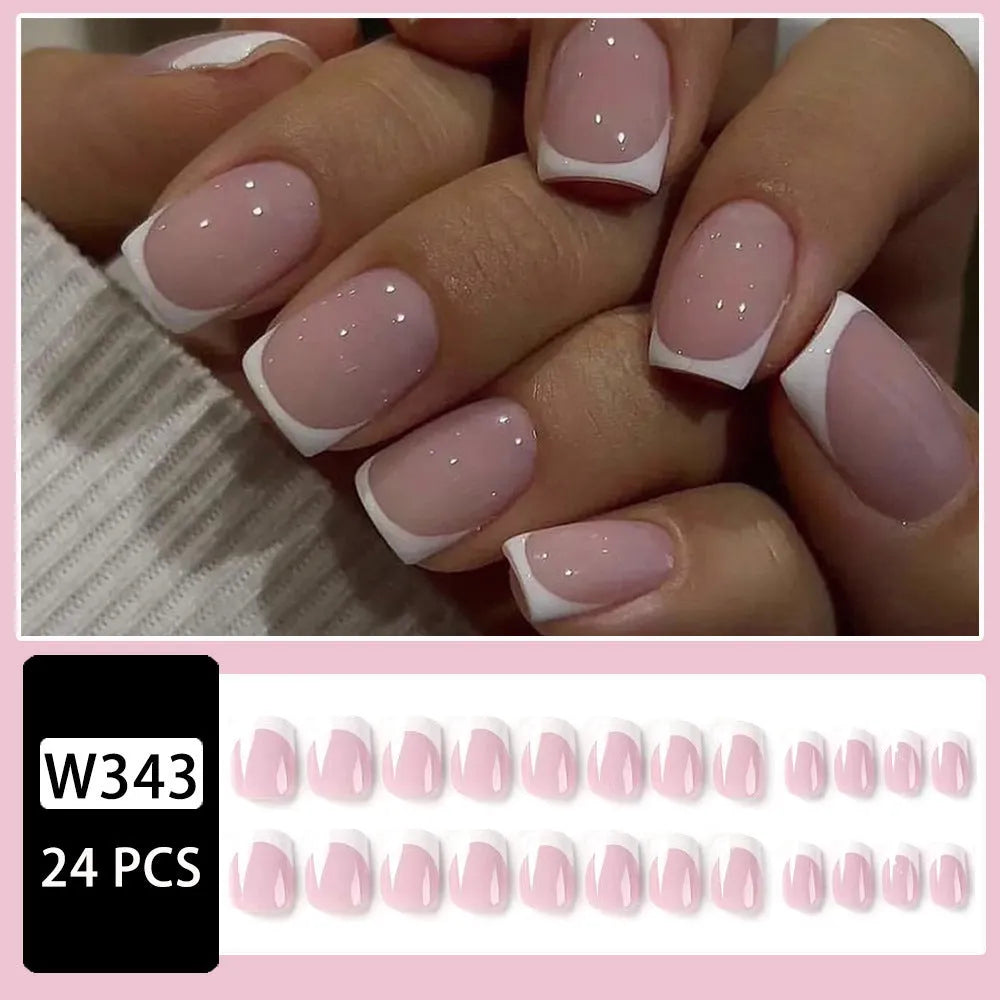 White fake nails with black and white plaid pattern, 24 pieces in an open box.