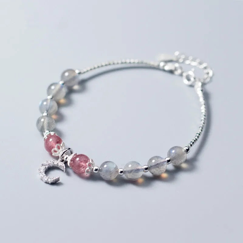 Natural moonstone handmade bracelet with crescent moon and crystal charms on adjustable chain