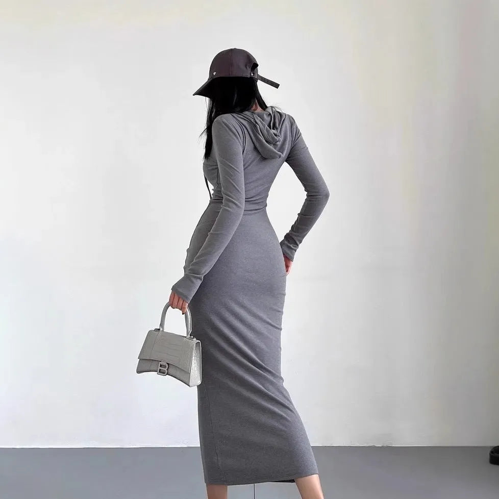 Women's long hooded dress with long sleeves and a sheath silhouette in polyester.