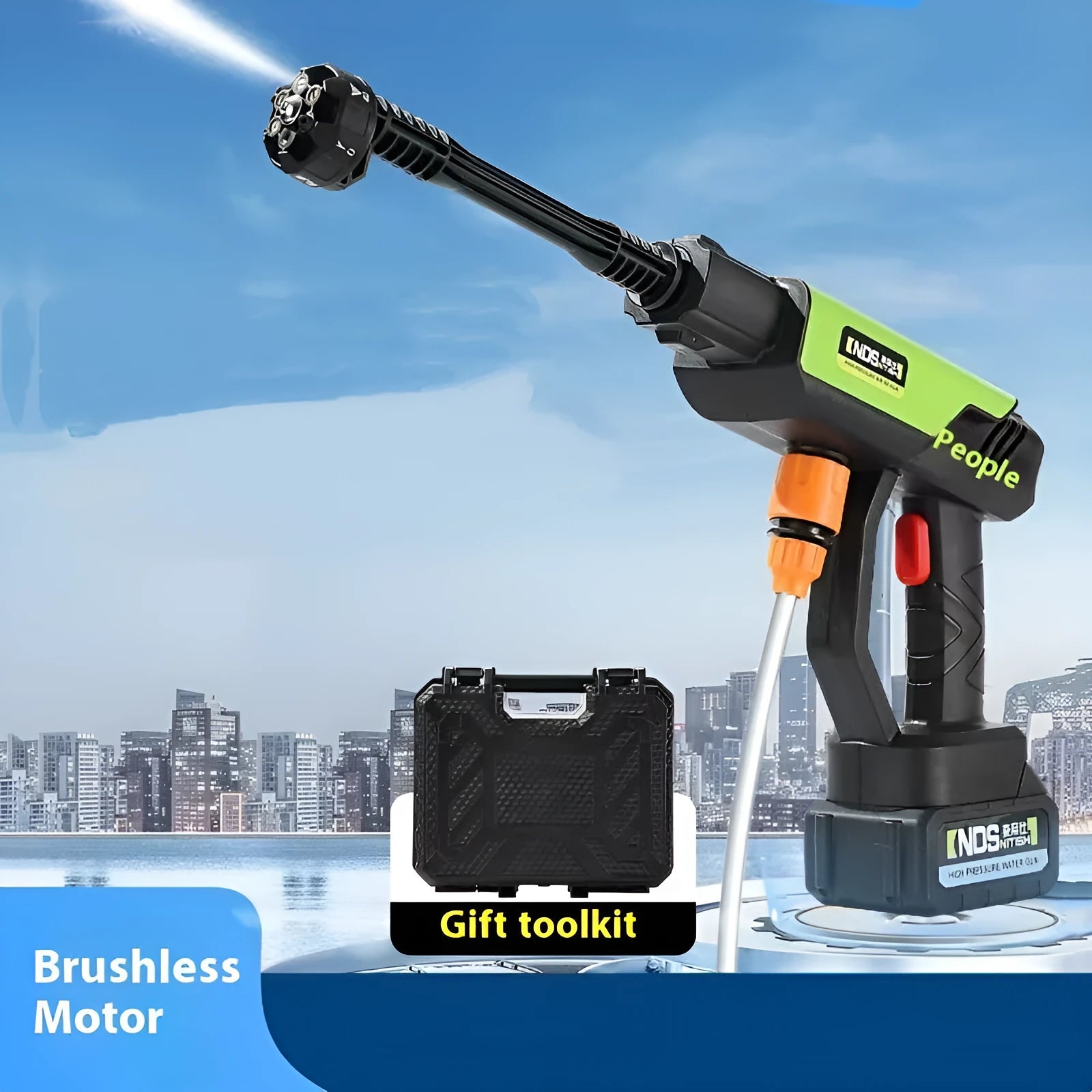 Green wireless high-pressure water gun with multiple nozzle attachments on a patio.