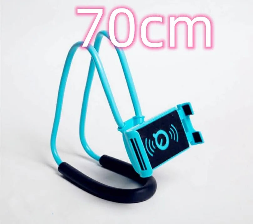 White plastic and foam 360-degree rotatable universal phone holder on a table.