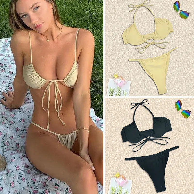Women's black and mint green nylon bikini swimsuit set showing bra and briefs.