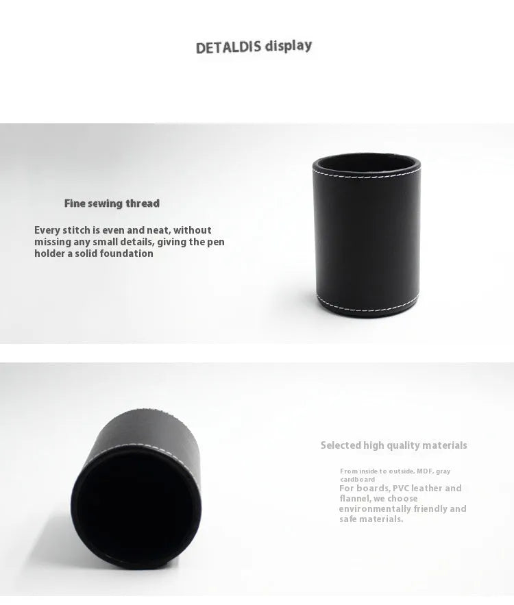 Small round black leather pen holder on a desk.