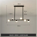 Glass bubble ball chandelier with black iron frame, clear glass shades, and multiple arms