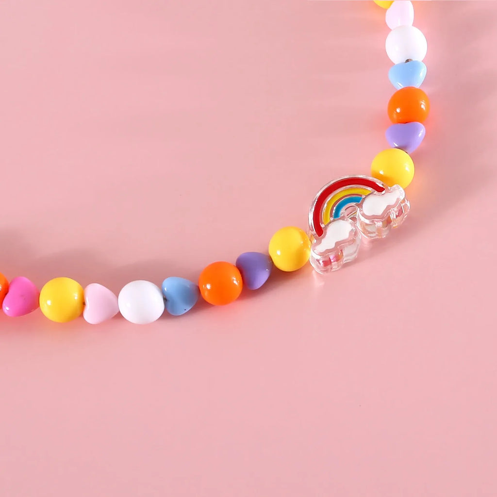 Colourful plastic bead pet necklace in peach, rainbow, and small flower designs for cats and dogs