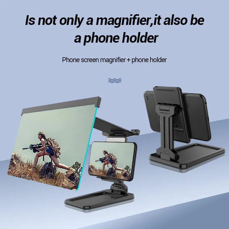 Black folding mobile phone screen amplifier with detachable holder next to an iPhone.