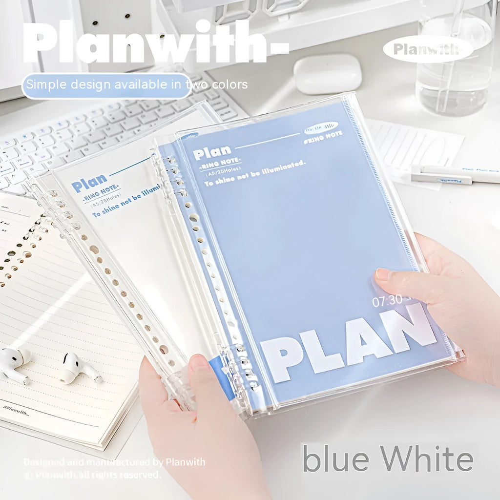 Blue and white A5 PVC spiral notebook with Wire-O binding on a flat surface