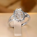 Silver women's ring with cross and lace pattern design in electroplated alloy