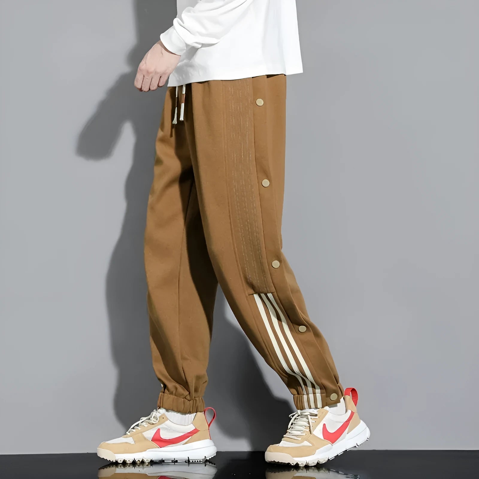 Men's loose fit sweatpants with ankle-tied cuffs in cotton blend fabric