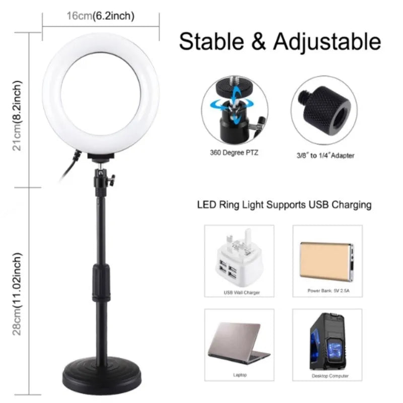 Black ring-shaped desktop fill light with two mobile phone holders placed on a table