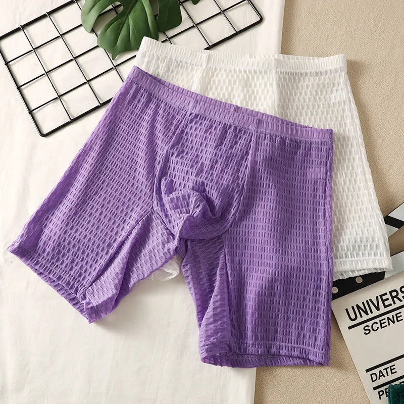 Men's solid colour lace shaping boxer shorts in white on a mannequin