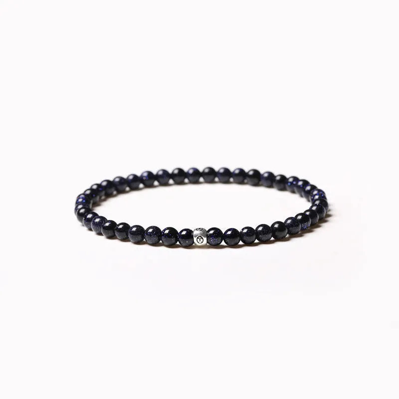 Geometric agate bracelet with obsidian, blue san and cut surface black agate beads