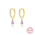 A pair of S925 sterling silver geometric water drop stud earrings on a gold or silver background.