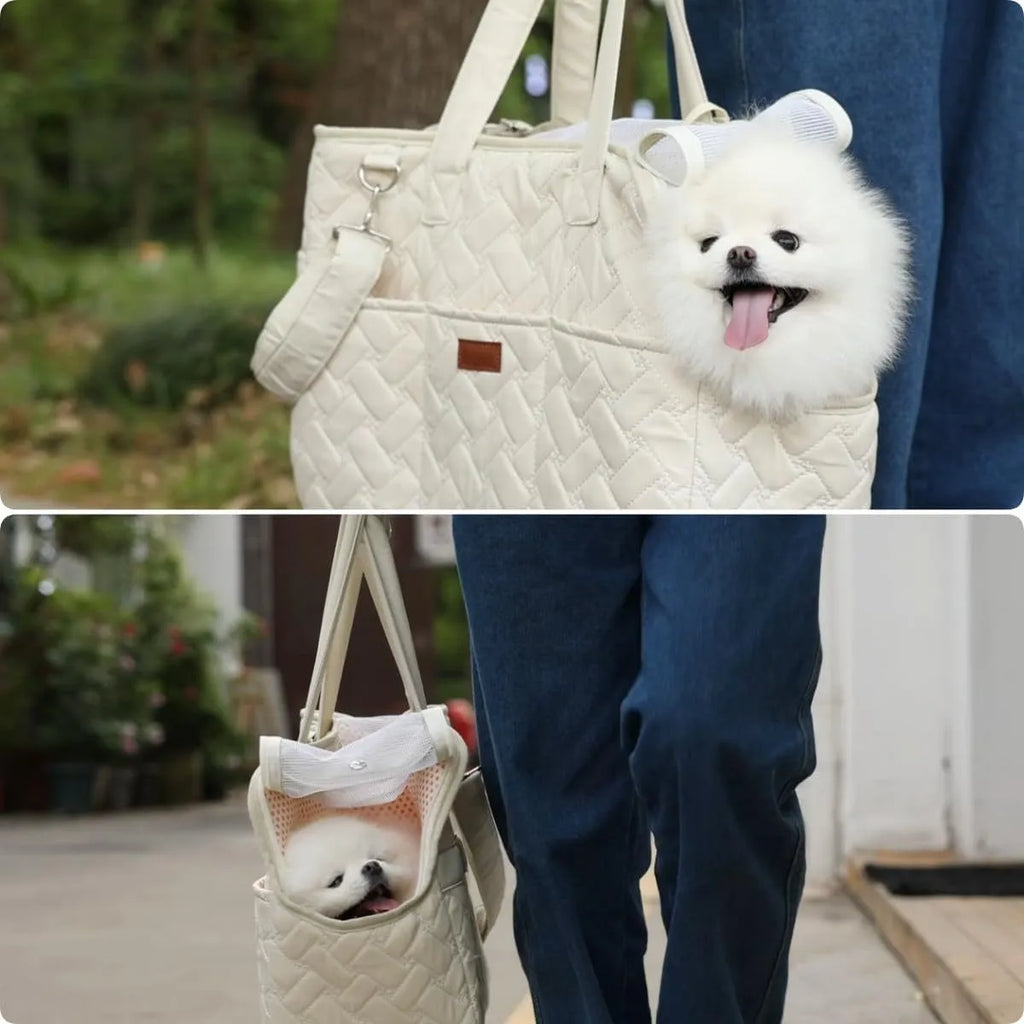 Grey pet carrier handbag with mesh panels showing interior cushion and safety cord attachment