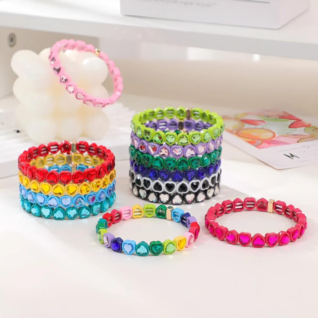 Rainbow enamel heart bracelet in alloy with colourful stretch band and unisex styling