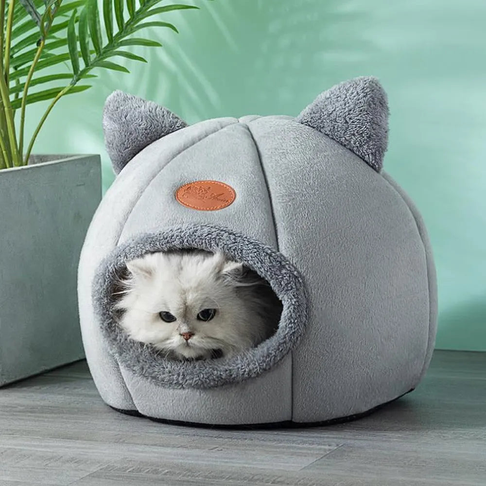 Large enclosed winter cat sofa bed with plush lining for indoor pet warmth