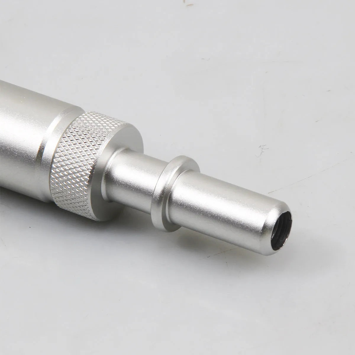 Silver metal transmission refuelling joint tool VAS6262-9 for automotive fluid transfer.