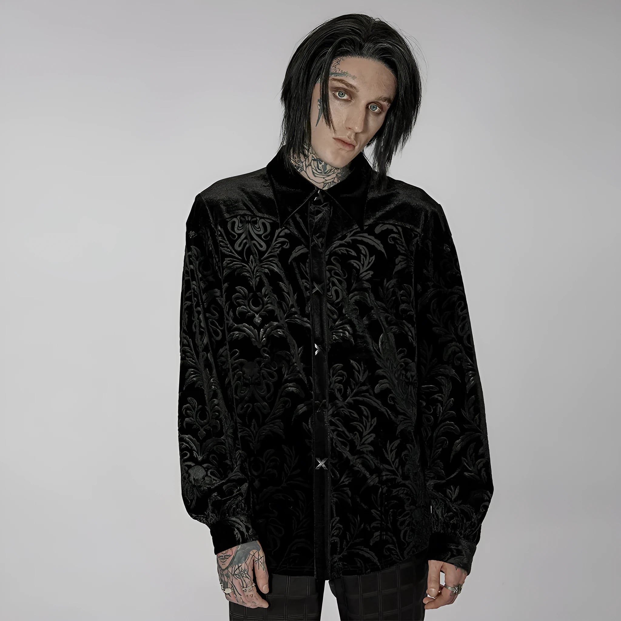 Black velvet men's shirt with pointed collar and decorative flocking details in British preppy style