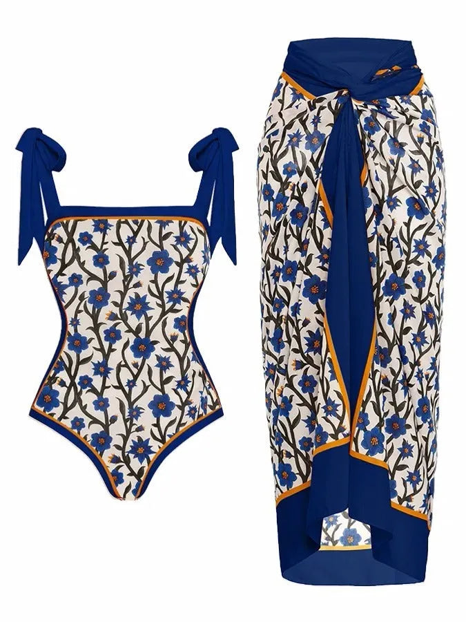 Women's printed floral chiffon swimsuit two-piece set with a matching skirt.