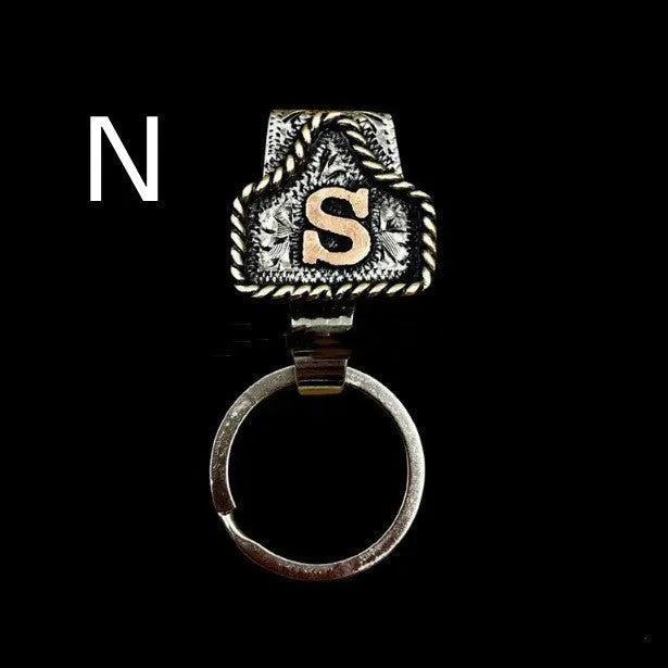 Handmade metal cow tag belt keychain in rustic design with multiple colour options