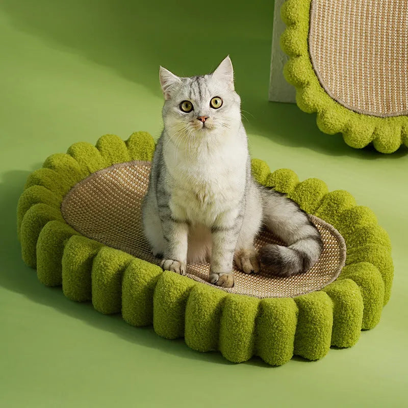 Green oval cat scratching pad and bed made from sisal material