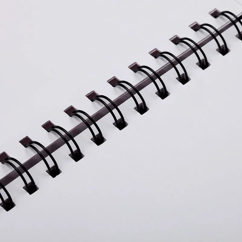 Blank A4 drawing sketch book showing coil binding and heavy-weight white paper for artwork.