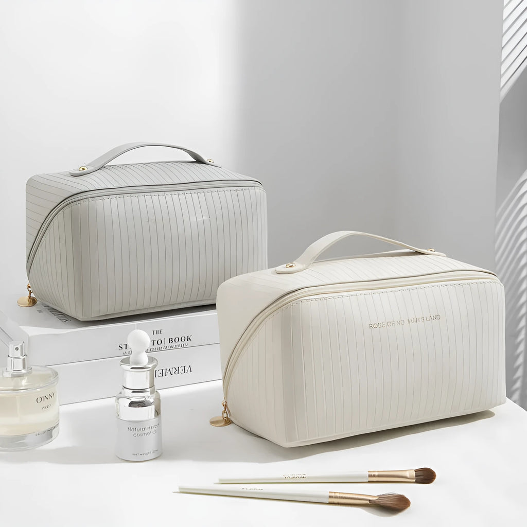 Vertical pattern cubic PU makeup bag in beige, shown with dimensions 22.5cm by 12.5cm.