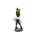 Pastoral style synthetic resin frog ornament for home decoration on a wooden shelf.