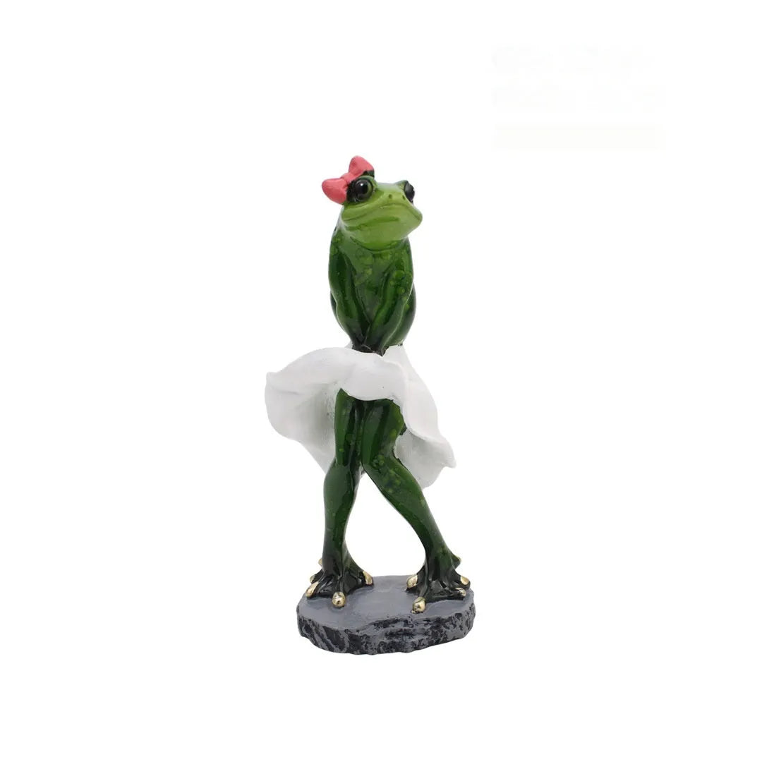 Pastoral style synthetic resin frog ornament for home decoration on a wooden shelf.