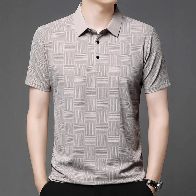 Man wearing a slim fit lapel T-shirt in a chemical fibre blend, available in multiple colours.